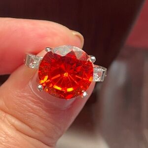 Large round Gem set in Silver rhodium Plated.